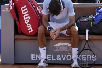 Roger Federer head down profile